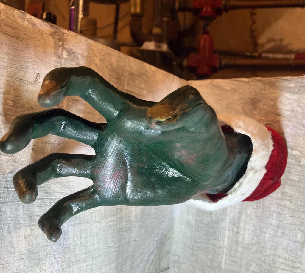 Horror Hands Reaching Out Of Wall