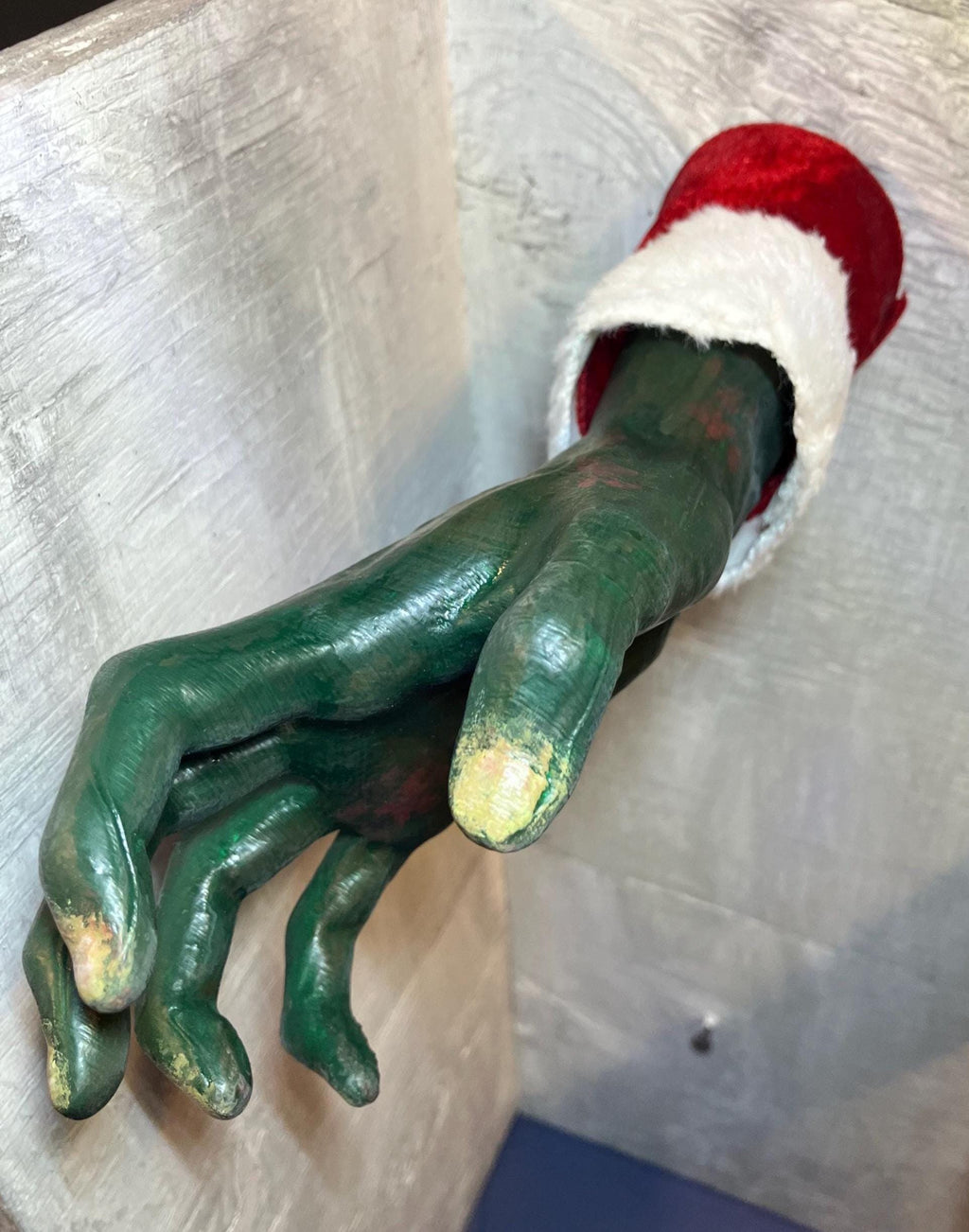 Horror Hands Reaching Out Of Wall